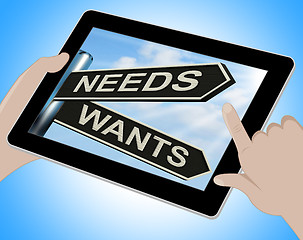 Image showing Needs Wants Tablet Means Necessity And Desire