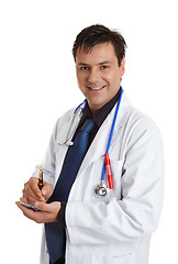 Image showing Smiling Doctor with writing pen and pad