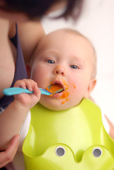 Image showing Feeding of a small child