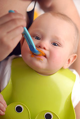 Image showing Feeding of a small child