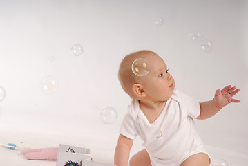 Image showing Child with the soap bubbles