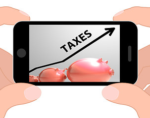 Image showing Taxes Arrow Displays Higher Taxation And Levies