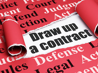 Image showing Law concept: black text Draw up A contract under the piece of  torn paper
