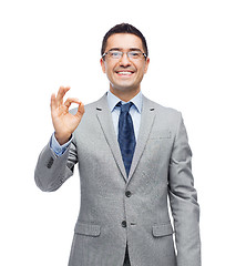 Image showing happy smiling businessman in eyeglasses and suit