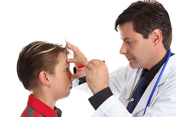 Image showing Doctor checking patient eyes