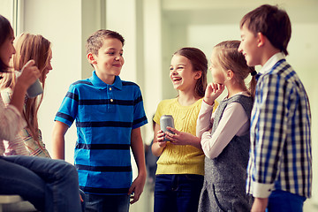 Image showing group of school kids with soda cans in corridor