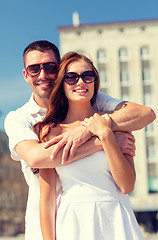 Image showing smiling couple in city