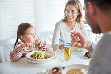 Image showing happy family having dinner at restaurant or cafe