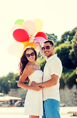 Image showing smiling couple in city