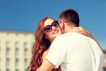 Image showing smiling couple in city