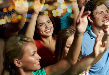 Image showing smiling friends at concert in club