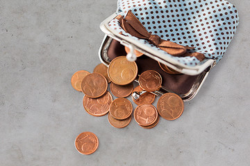 Image showing close up of euro coins and wallet on table