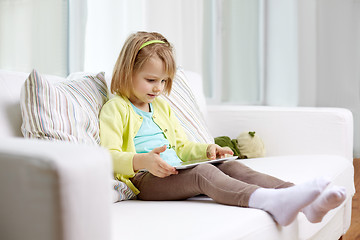 Image showing little girl with tablet computer at home