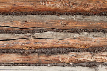 Image showing wall of the old logs caulking hemp