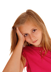 Image showing Pretty blond girl with her hand on head.