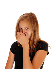 Image showing Young girl closing her nose with hand.