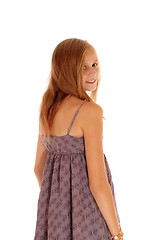 Image showing Pretty girl looking over shoulder