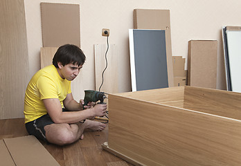 Image showing Assembling furniture