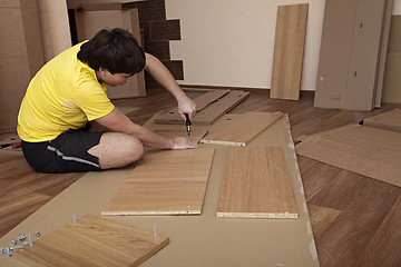 Image showing Assembling furniture