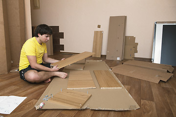 Image showing Assembling furniture