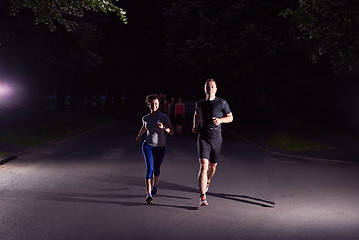 Image showing couple jogging at early morning