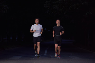 Image showing couple jogging at early morning