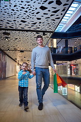 Image showing young family with shopping bags