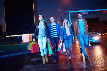 Image showing Group Of Friends Enjoying Shopping