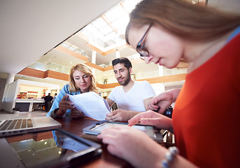 Image showing students group working on school  project  together