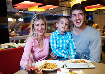 Image showing family having lunch in shopping mall