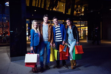 Image showing Group Of Friends Enjoying Shopping