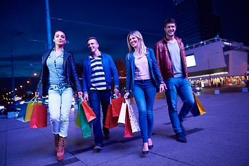 Image showing Group Of Friends Enjoying Shopping