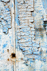 Image showing metal nail dirty stripped paint in blue