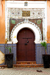 Image showing old door in morocco  wall ornate brown