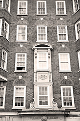 Image showing in europe london old red brick wall and      historical window