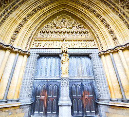 Image showing rose window weinstmister  abbey in london old church door and ma