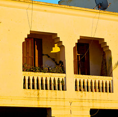 Image showing   yellow window in morocco africa old construction and brown wal