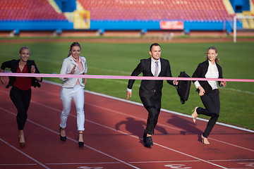 Image showing business people running on racing track