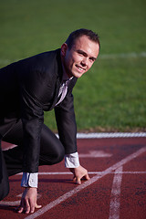 Image showing business man ready to sprint