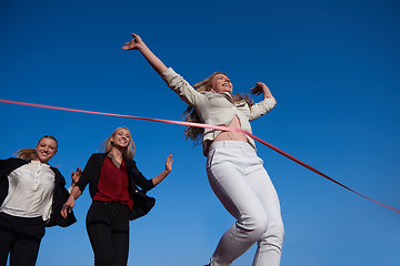 Image showing business people running on racing track