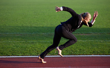 Image showing business man ready to sprint