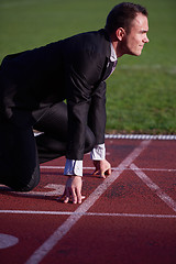 Image showing business man ready to sprint