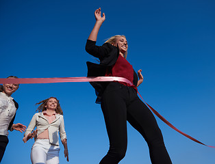 Image showing business people running on racing track