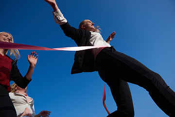 Image showing business people running on racing track