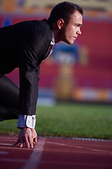 Image showing business man ready to sprint