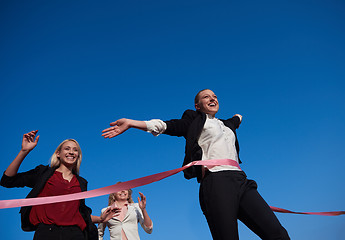 Image showing business people running on racing track