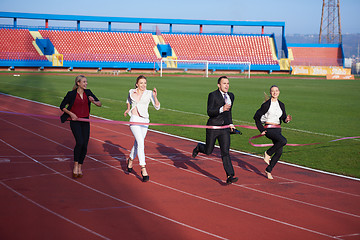 Image showing business people running on racing track