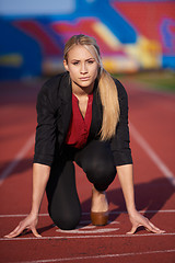 Image showing business woman ready to sprint