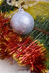 Image showing Closeup of Christmas balls and green fir tree branch, new year invitation card