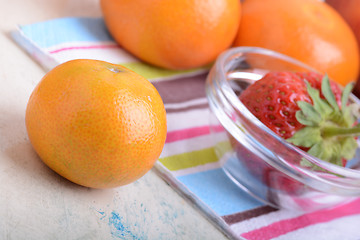 Image showing Fresh colorful fruits composition mandarin, strawberry, peach, bananas and orange